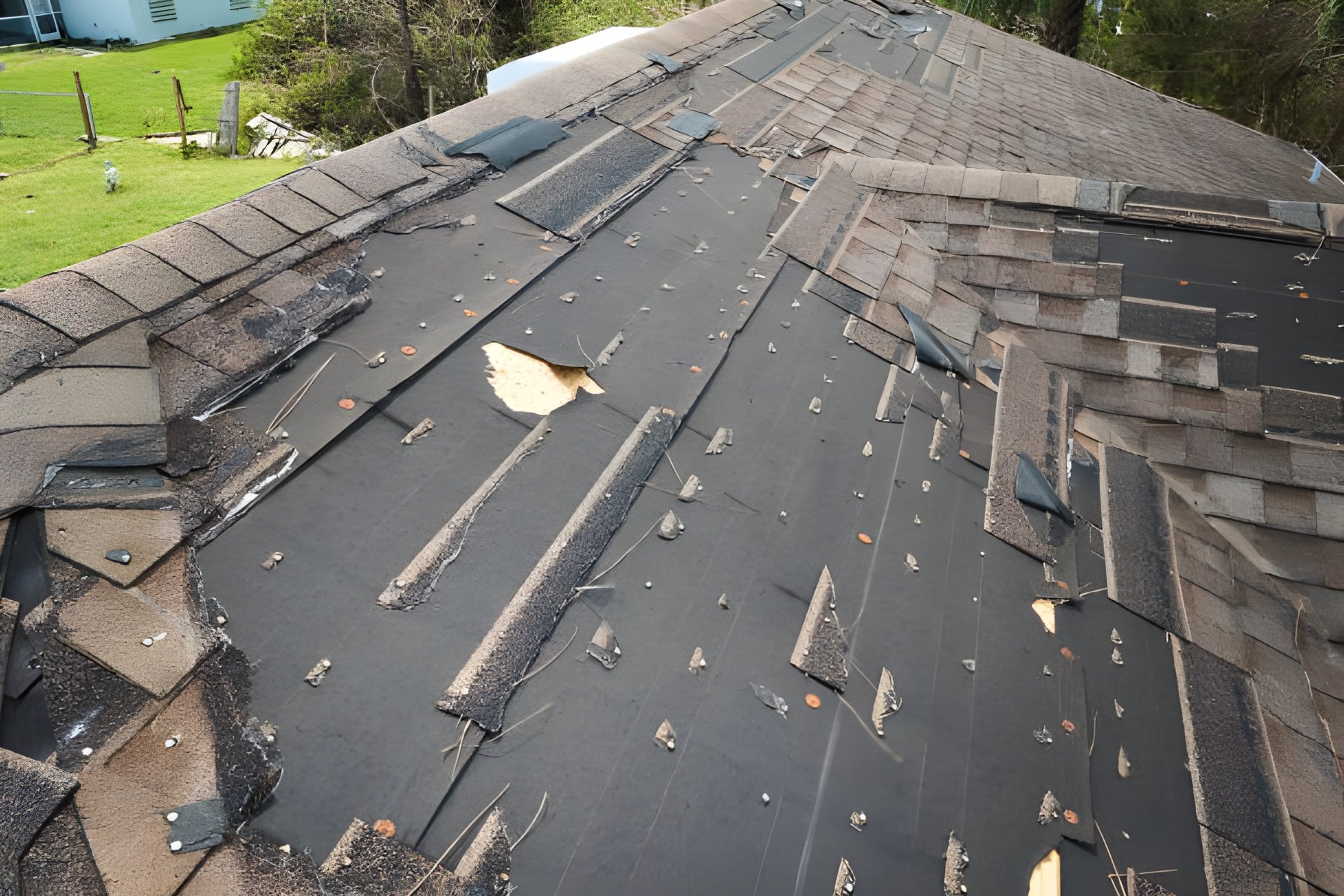 Documented storm-damaged roof before restoration work